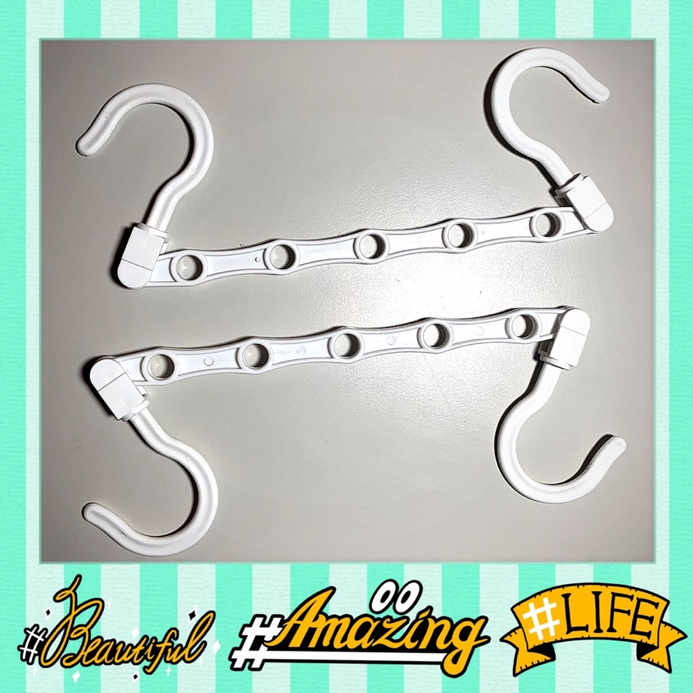 2 White Space Saving Hangers